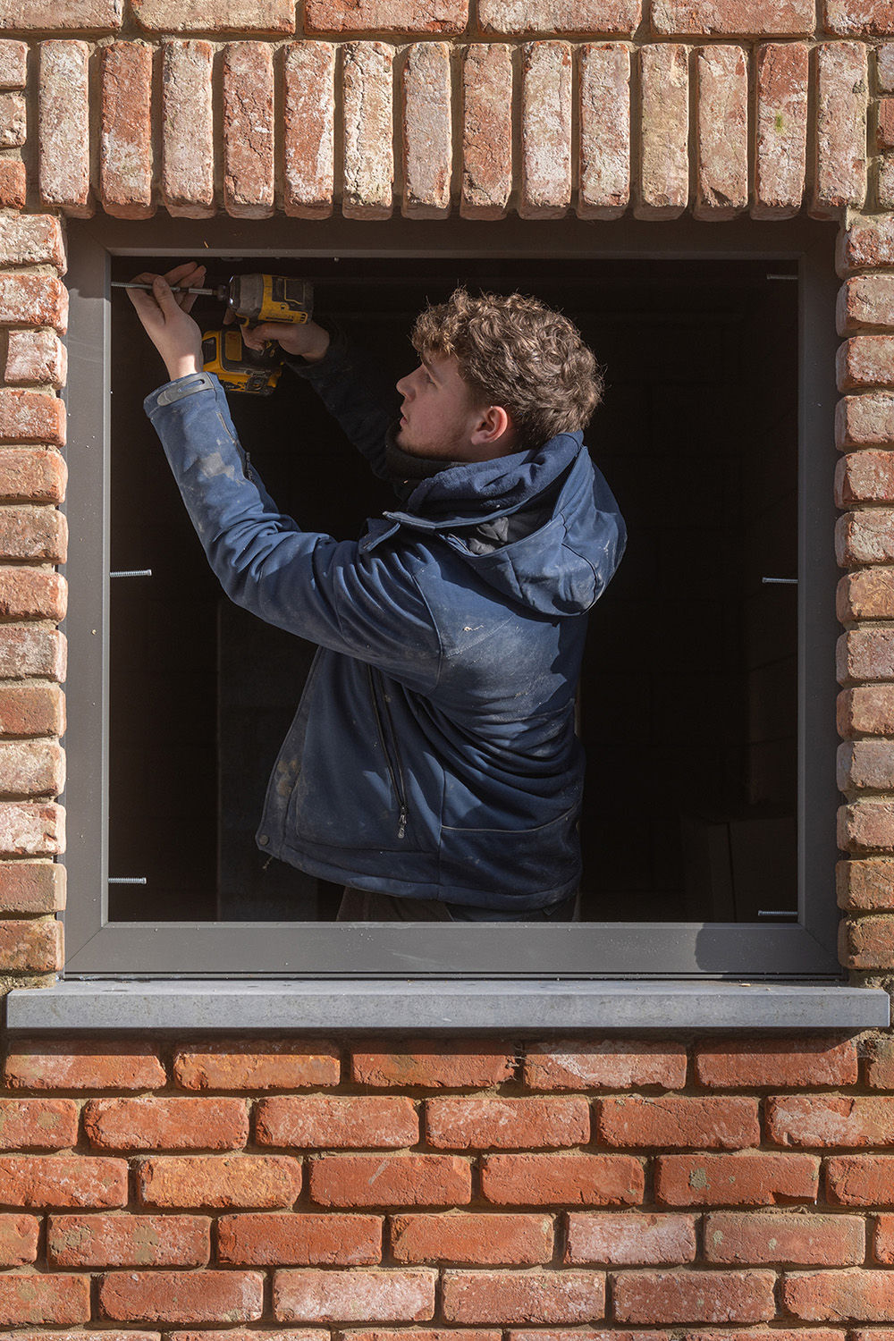 IM_poseur_brique rouge